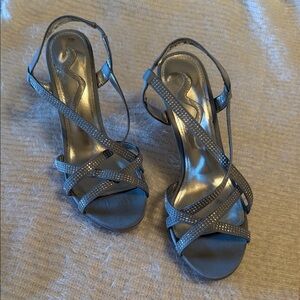 Nina Satin collection.Shine in Silver-grey blue strappy 4” heels. Leather sole.